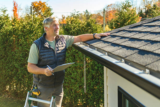 Professional Storm Damage Roof Repair technician working in De Beque, CO